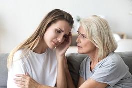 Woman being comforted Woman being comforted